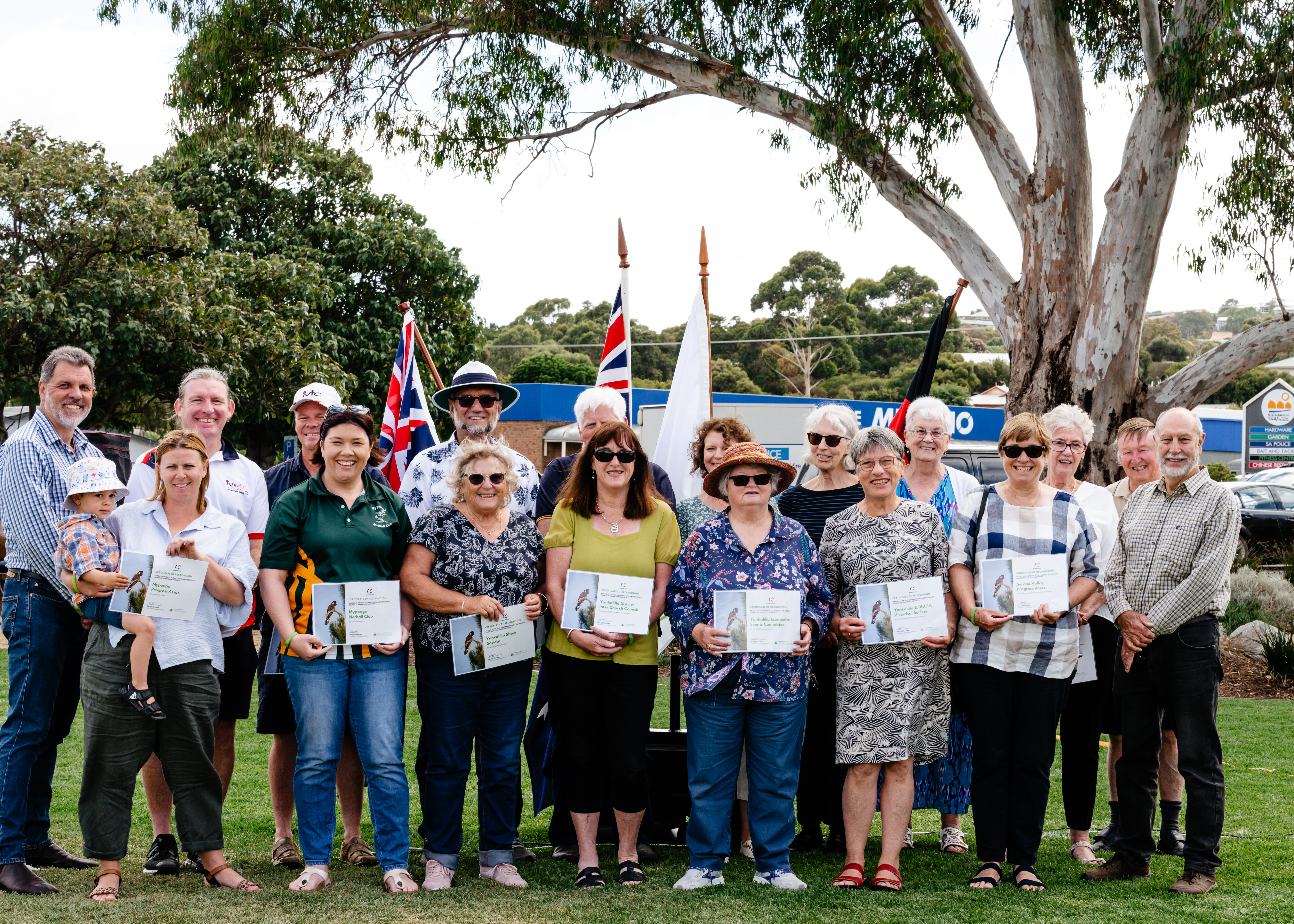 An image of the representatives who received awards on behalf of community groups who were presented community grant certificates