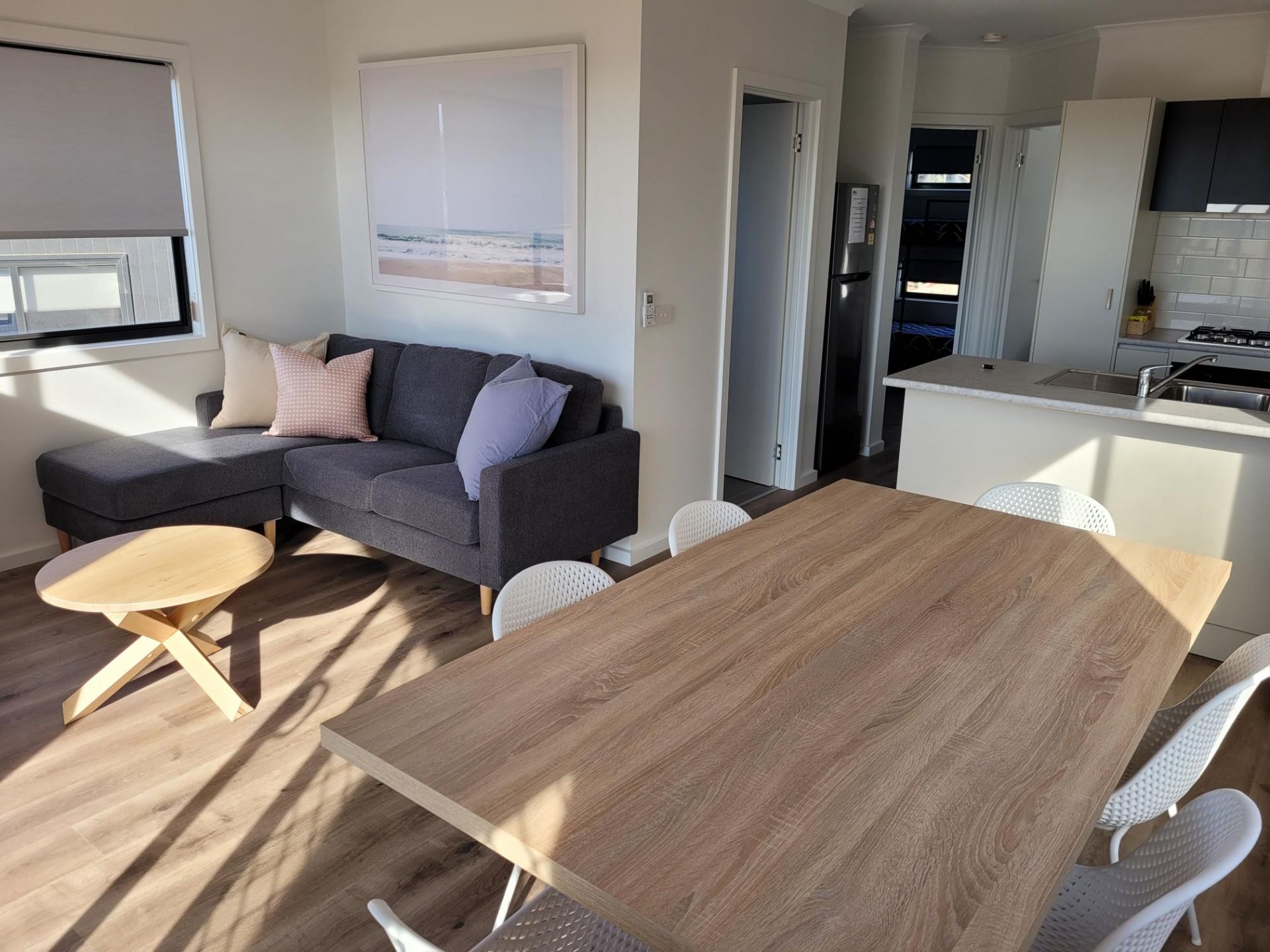 A photo of the interior living area of one of our executive cabins. It is modern, fresh and new.