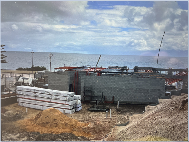 A photo of the block work at the Normanville Surf Life Saving Club. The photo shows that the first floor blockwork has been completed.