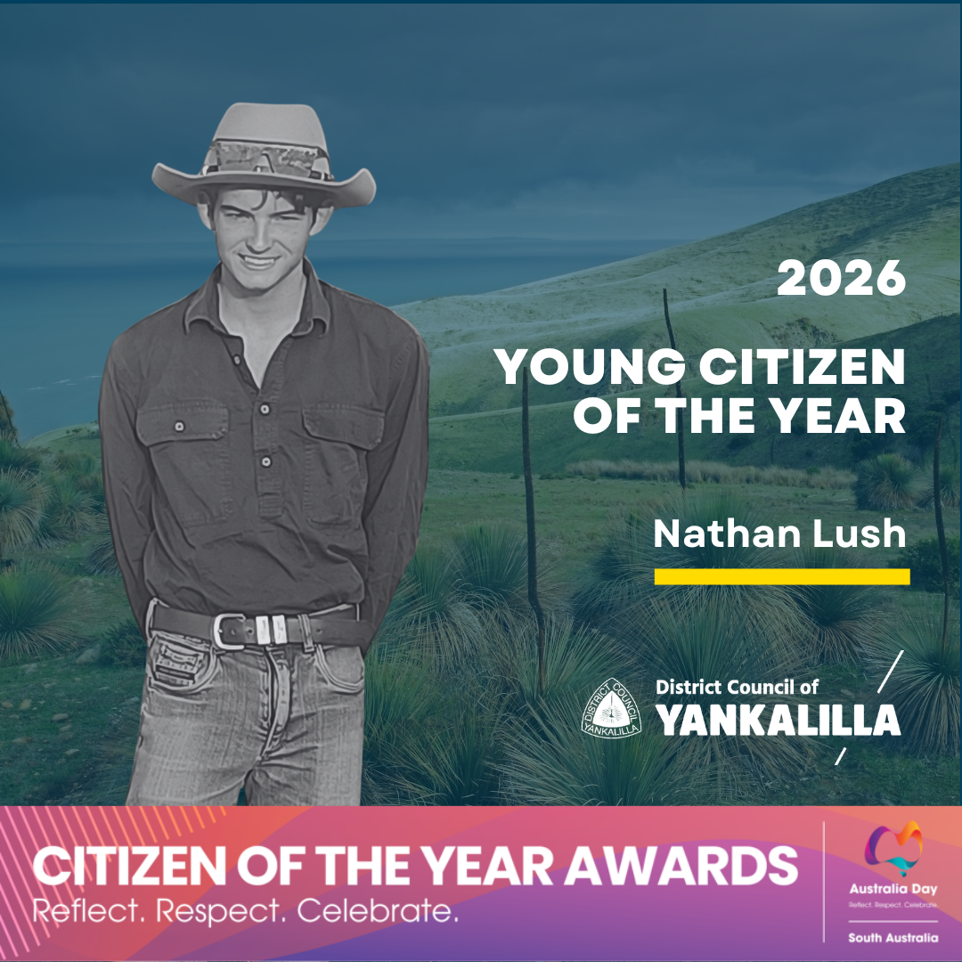 Photograph featuring a young man wearing a hat and casual clothing standing outdoors with a grassy hill background, accompanied by text announcing Nathan Lush as the 2026 Young Citizen of the Year. The design includes logos for District Council of Yankalilla and Australia Day South Australia, with a colorful banner at the bottom highlighting the Citizen of the Year Awards and the tagline "Reflect. Respect. Celebrate."