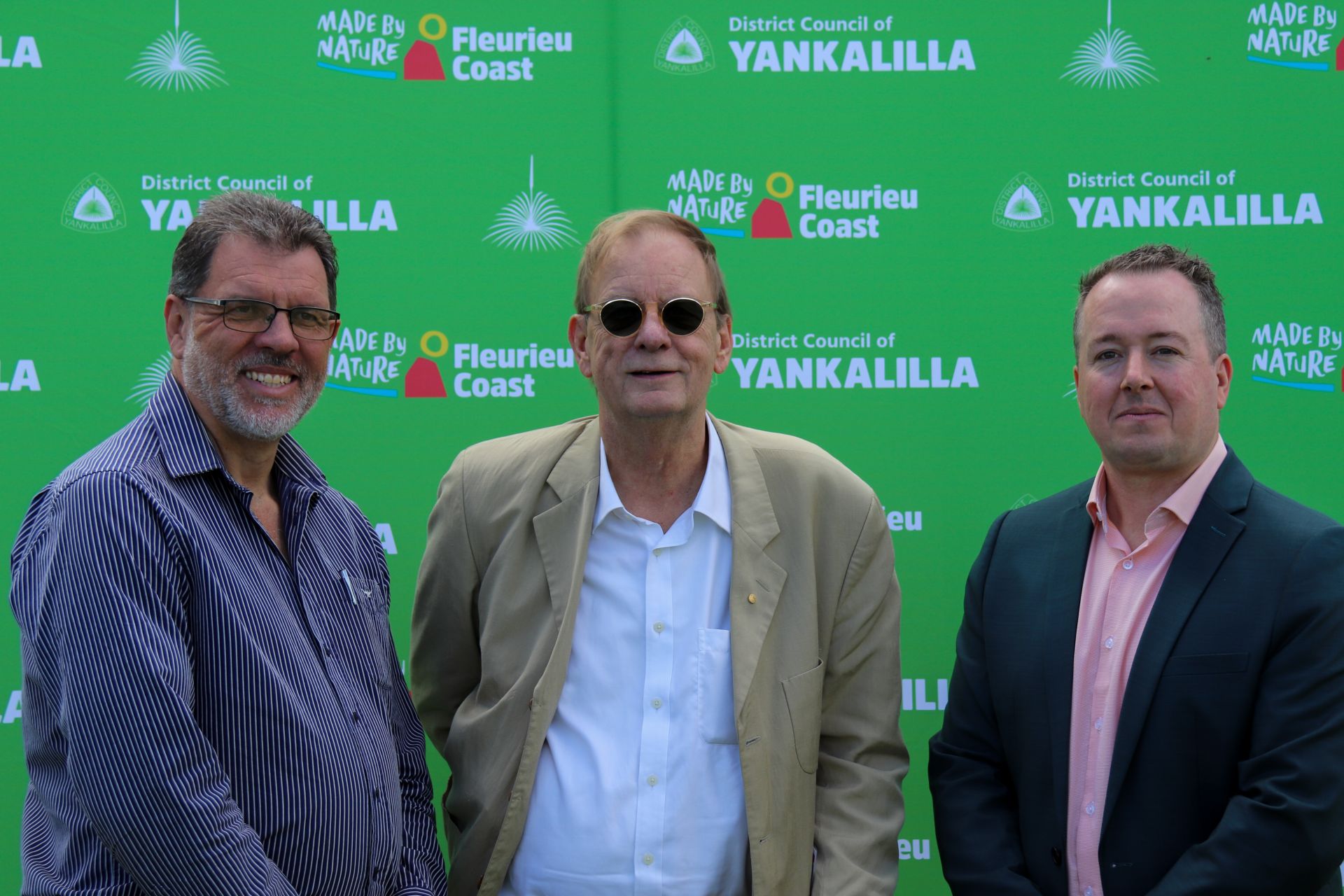 The Mayor, Peter Goers and CEO posing for a photo