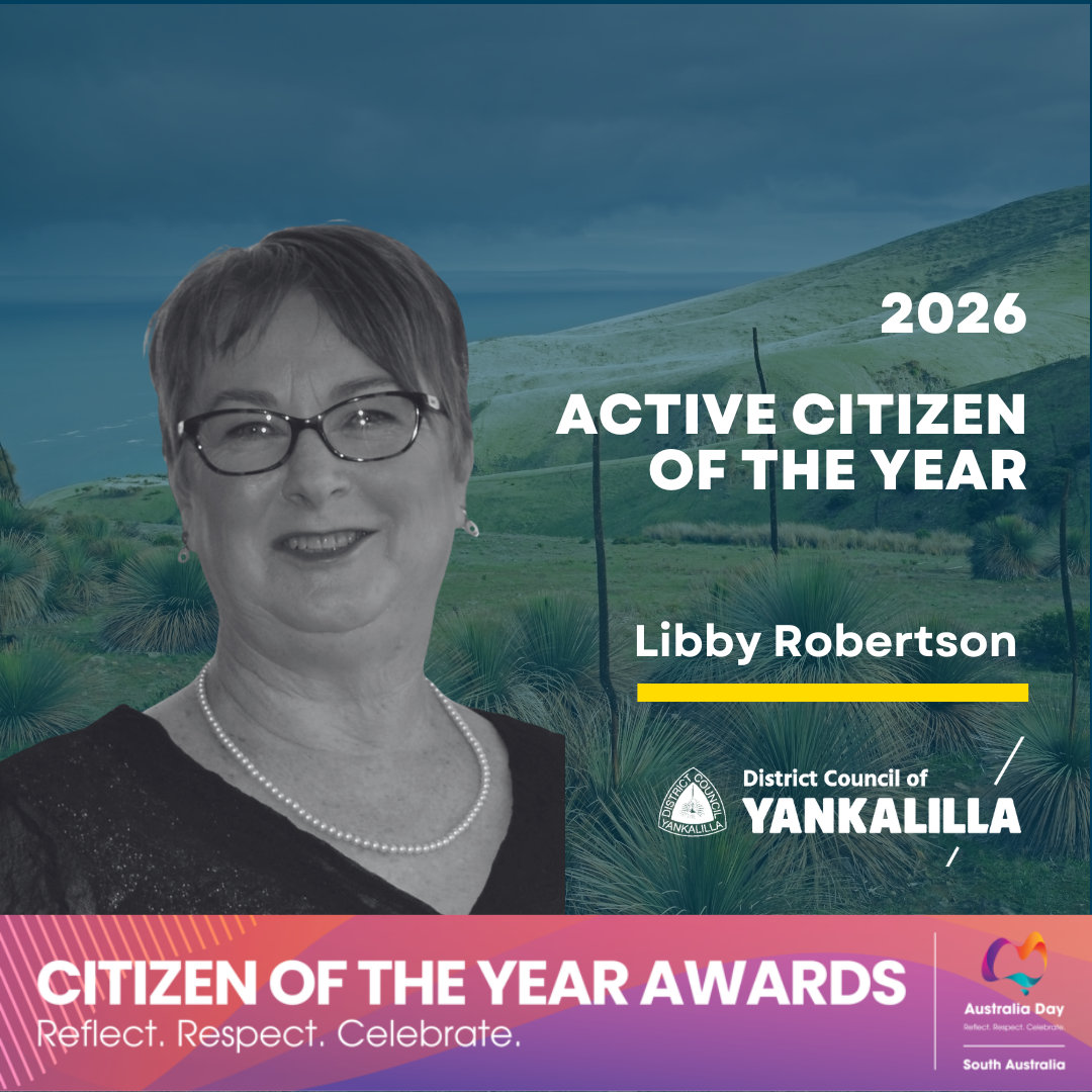 Photograph promoting the 2026 Active Citizen of the Year award featuring Libby Robertson, presented by District Council of Yankalilla. The design includes a natural landscape background, bold white text, a yellow underline beneath the winner's name, and a pink and purple banner at the bottom with the Australia Day South Australia logo and the tagline "Reflect. Respect. Celebrate." AI-generated content may be incorrect.